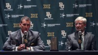 Baylor Bears interim president David E. Garland (right) and new athletic director Mack Rhoades (left) speak at a press conference during the Big 12 Media Days at Omni Dallas Hotel. Mandatory Credit: Kevin Jairaj-Imagn Images