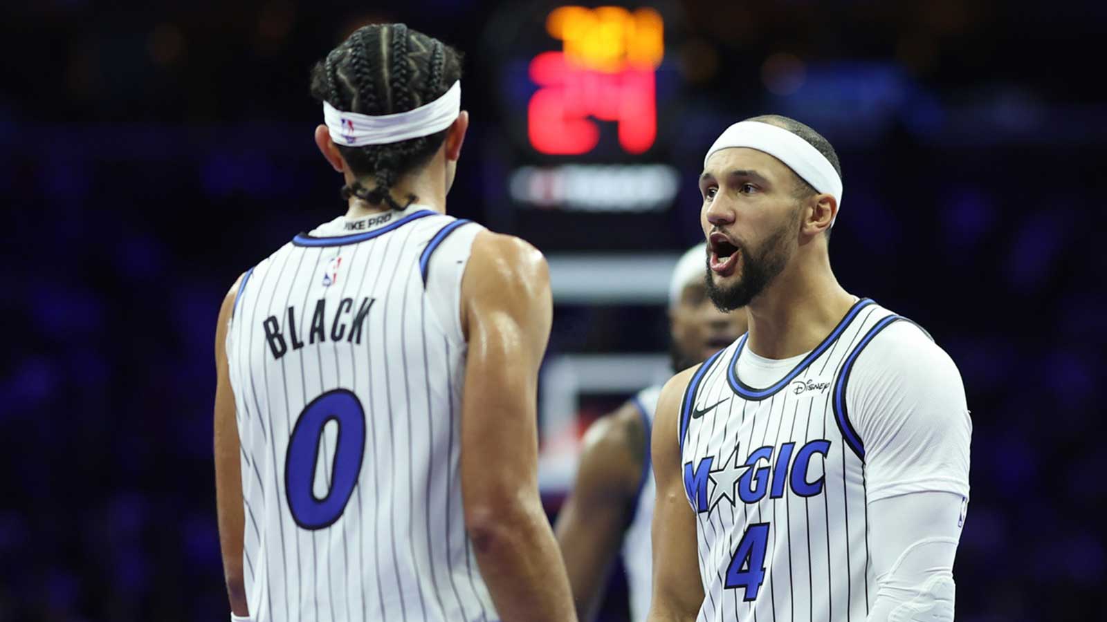 Orlando Magic guard Anthony Black (0) reacts with guard Jalen Suggs (4) after scoring against the Philadelphia 76ers during the second quarter at Xfinity Mobile Arena. 