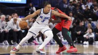 Orlando Magic guard Desmond Bane (3) is guarded baby Portland Trail Blazers guard Sidy Cissoko (91) in the second quarter at Kia Center.