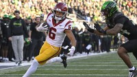 USC Trojans wide receiver Makai Lemon (6) catches a pass for a touch down during the first half against the Oregon Ducks at Autzen Stadium.