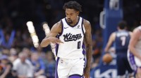 Sacramento Kings guard Malik Monk (0) gestures after scoring against the Oklahoma City Thunder during the second half at Paycom Center.