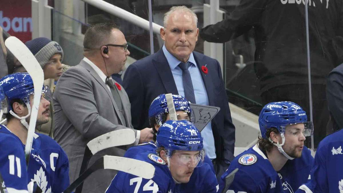 Toronto Maple Leafs head coach Craig Berube scowls on the bench after a goal by the Carolina Hurricanes during the third period at Scotiabank Arena.
