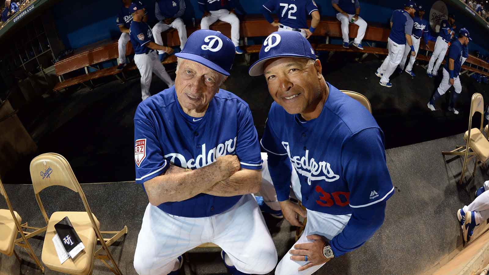 Former Los Angeles Dodgers manager Tommy Lasorda (left) and manager Dave Roberts pose for a photo prior to the game against the Cleveland Indians at Camelback Ranch. Mandatory Credit: Joe Camporeale-Imagn Images