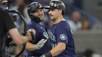 Seattle Mariners catcher Cal Raleigh (29) celebrates with first baseman Josh Naylor (12) after hitting a solo home run against the Toronto Blue Jays in the fifth inning during game seven of the ALCS round for the 2025 MLB playoffs at Rogers Centre.