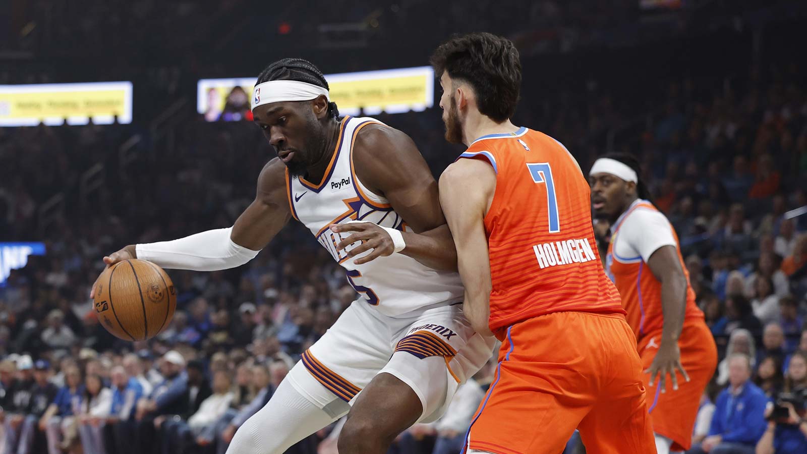 Phoenix Suns center Mark Williams (15) moves the ball against Oklahoma City Thunder center Chet Holmgren (7) during the first quarter at Paycom Center.