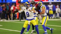 Los Angeles Rams quarterback Matthew Stafford (9) throws a pass against the Tampa Bay Buccaneers during the fourth quarter at SoFi Stadium.