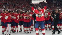 Florida Panthers left wing Matthew Tkachuk (19) hoist the Stanley Cup after game six of the 2025 Stanley Cup Final against the Edmonton Oilers at Amerant Bank Arena.
