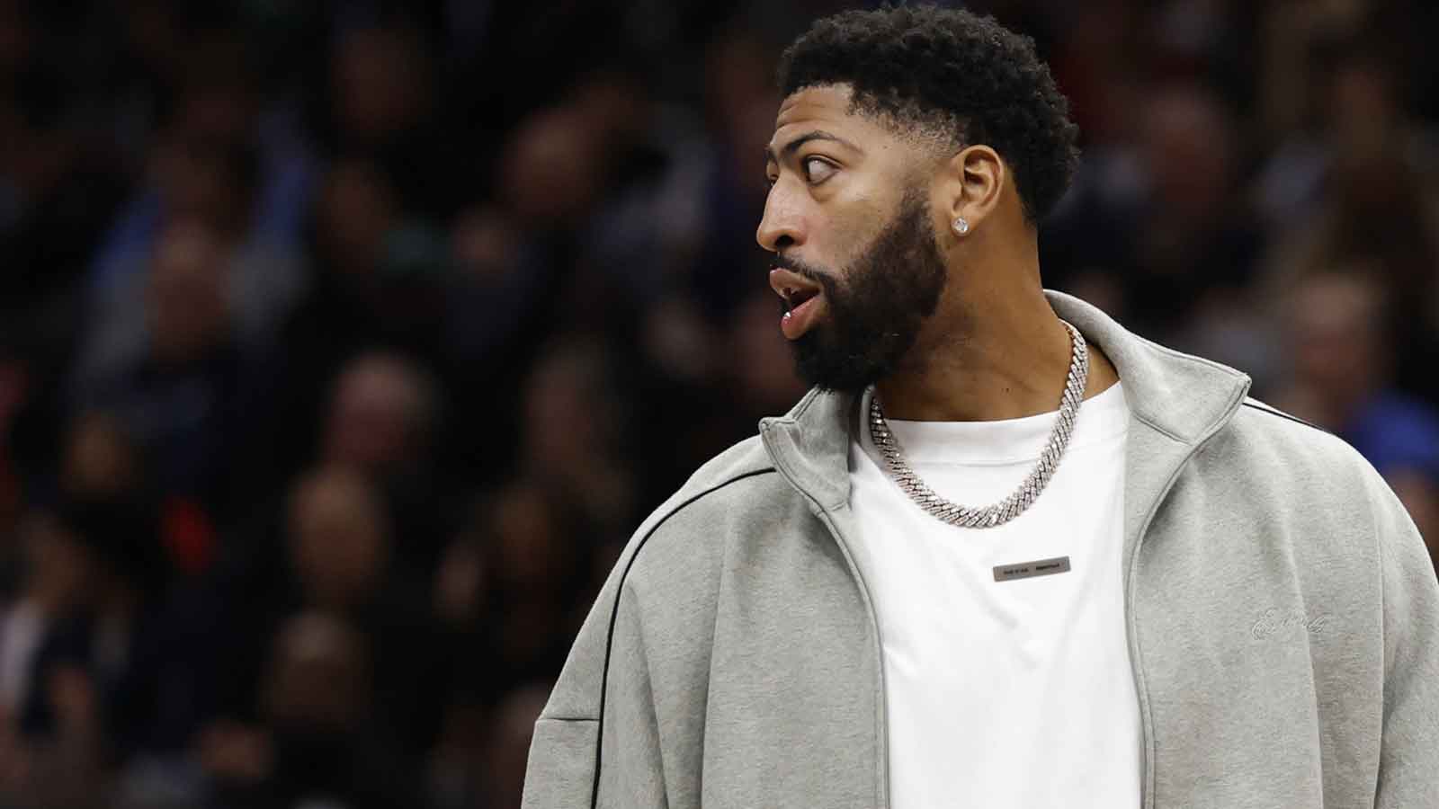 Injured Dallas Mavericks forward Anthony Davis looks on from the bench during a timeout against the Washington Wizards in the second half at Capital One Arena. 