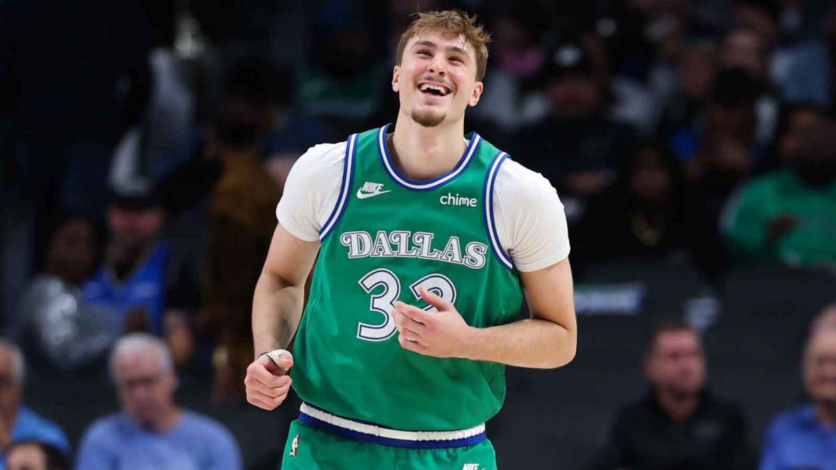 Mavericks forward Cooper Flagg (32) laughs