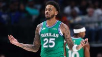 Dallas Mavericks forward P.J. Washington (25) reacts against the Milwaukee Bucks during the first quarter at American Airlines Center.
