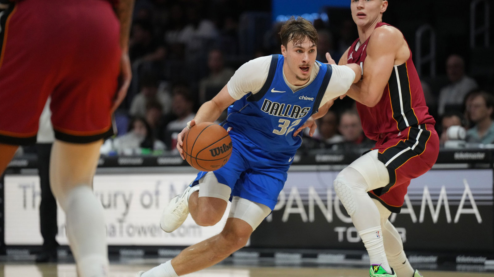 Mavericks forward Cooper Flagg (32) drives to the basket against the Miami Heat during the second half at Kaseya Center
