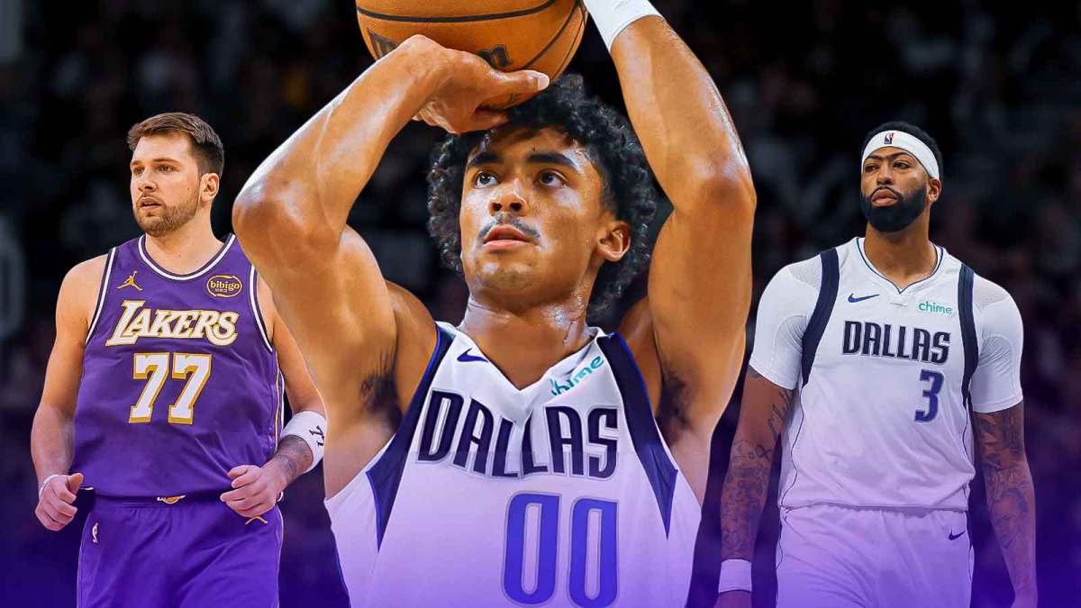 Mavericks Max Christie shooting a basketball in front. Lakers Luka Doncic and Mavericks Anthony Davis both looking serious in background.