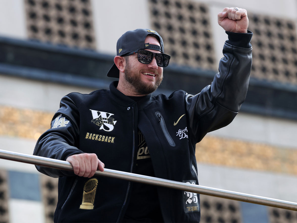 Los Angeles Dodgers third baseman Max Muncy acknowledges the crowd during the World Series championship parade at downtown Los Angeles.