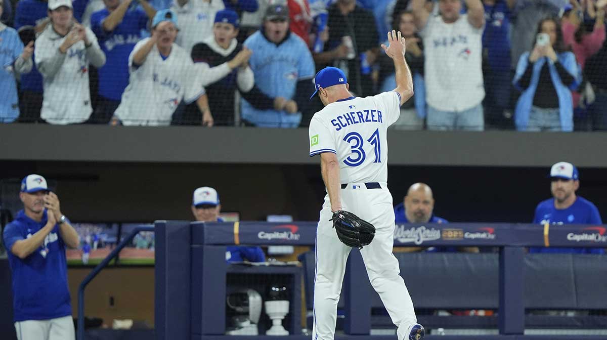 Toronto Blue Jays pitcher Max Scherzer (31) is relieved in the fifth inning against the Los Angeles Dodgers during game seven of the 2025 MLB World Series at Rogers Centre.