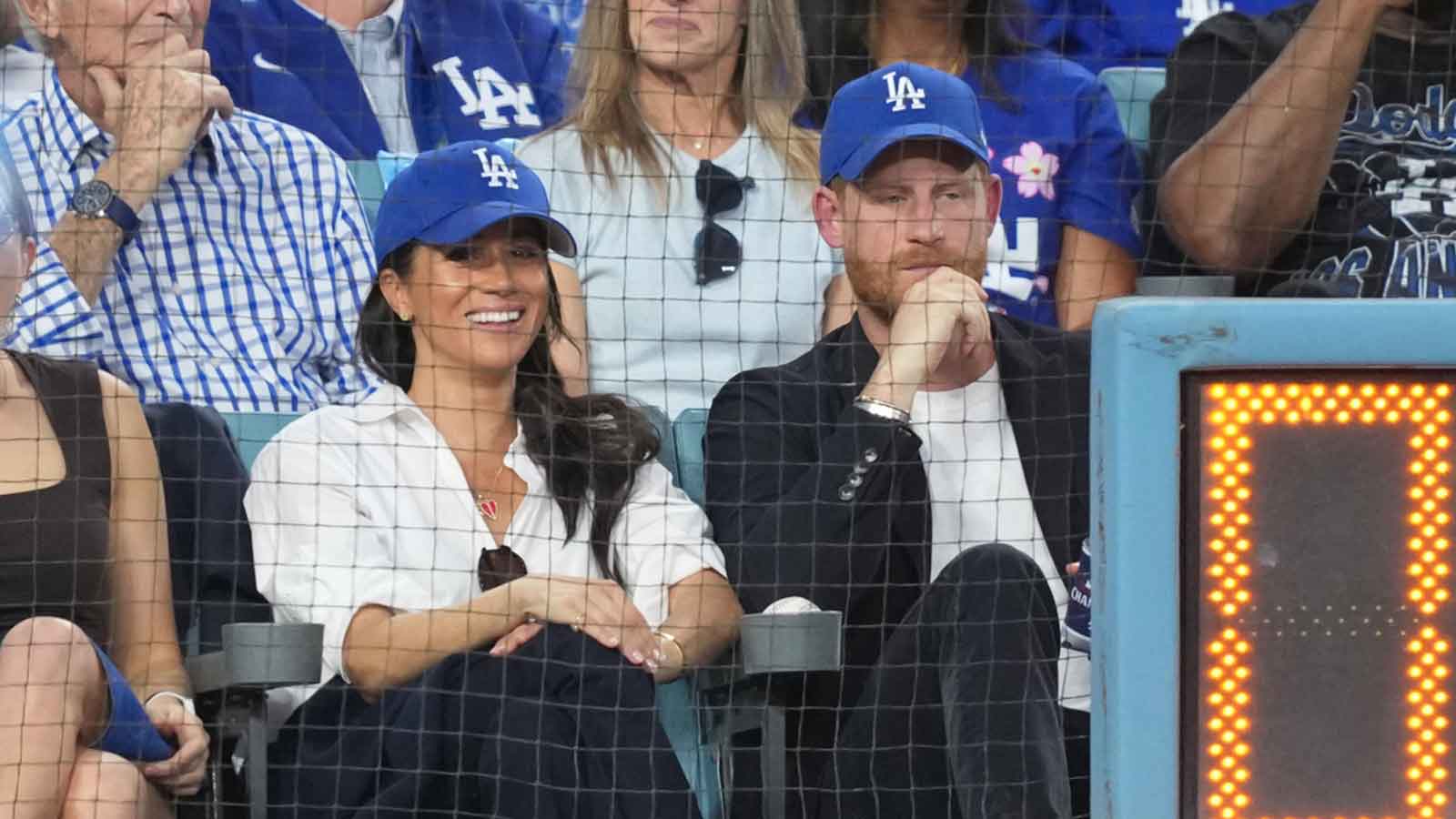 https://wp.clutchpoints.com/wp-content/uploads/2025/11/Meghan-Markle-and-Prince-Harry-at-Dodgers-game.jpg