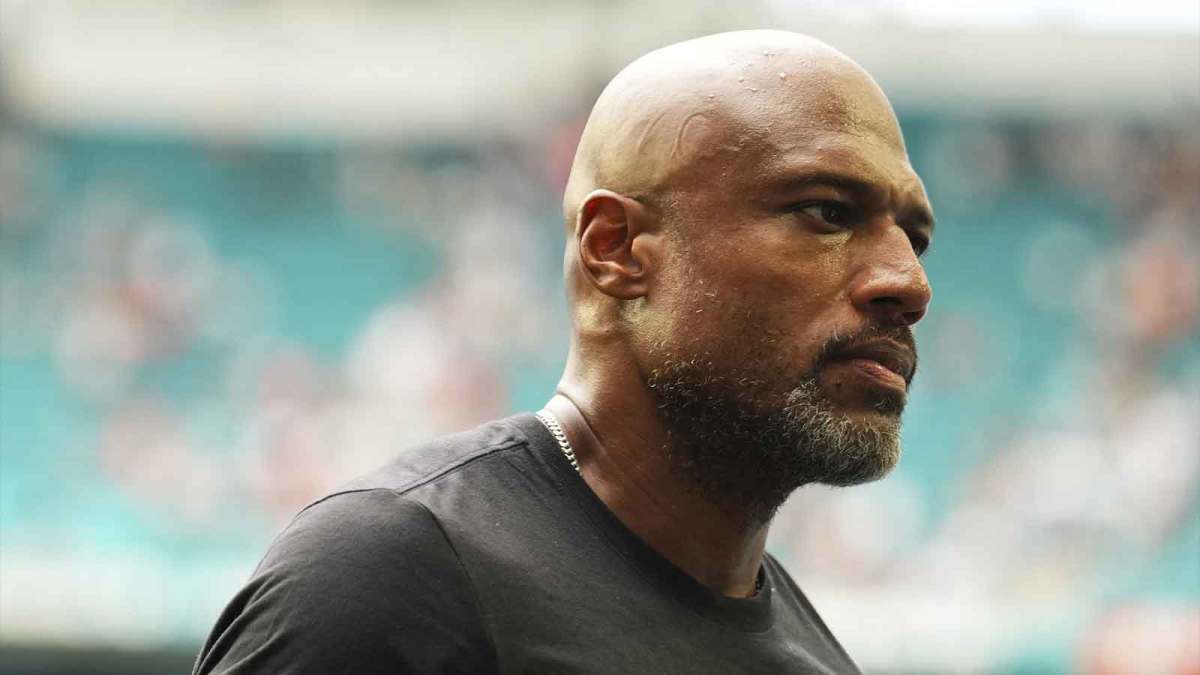 Oct 12, 2025; Miami Gardens, Florida, USA; Miami Dolphins defensive coordinator Anthony Weaver leaves the field after a game between the Miami Dolphins and the Los Angeles Chargers at Hard Rock Stadium. Mandatory Credit: Rich Storry-Imagn Images