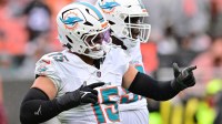 Miami Dolphins linebacker Jaelan Phillips (15) celebrates after a tackle during the first half against the Cleveland Browns at Huntington Bank Field.