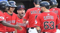 Cleveland Guardians manager Stephen Vogt (12) celebrates with his team after a three-run home run by shortstop Gabriel Arias (not pictured) in the fourth inning against the Miami Marlins at Progressive Field.