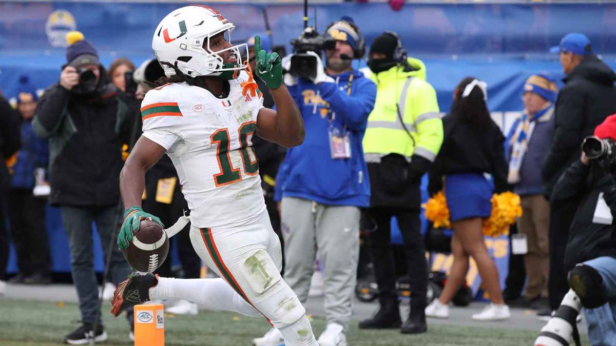Miami Hurricanes wide receiver Malachi Toney (10) reacts to the Panthers student section after catching a touchdown pass against the Pittsburgh Panthers during the second quarter at Acrisure Stadium.