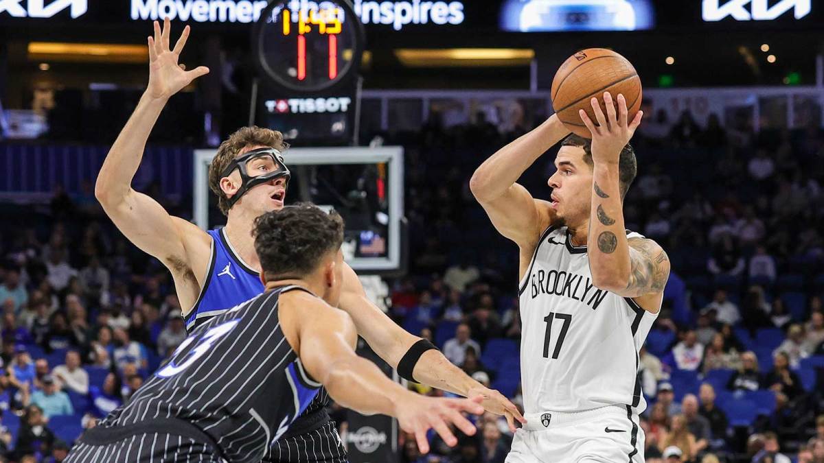 Brooklyn Nets forward Michael Porter Jr. (17) looks to pass in front of Orlando Magic forward Franz Wagner (22) during the first quarter at Kia Center.