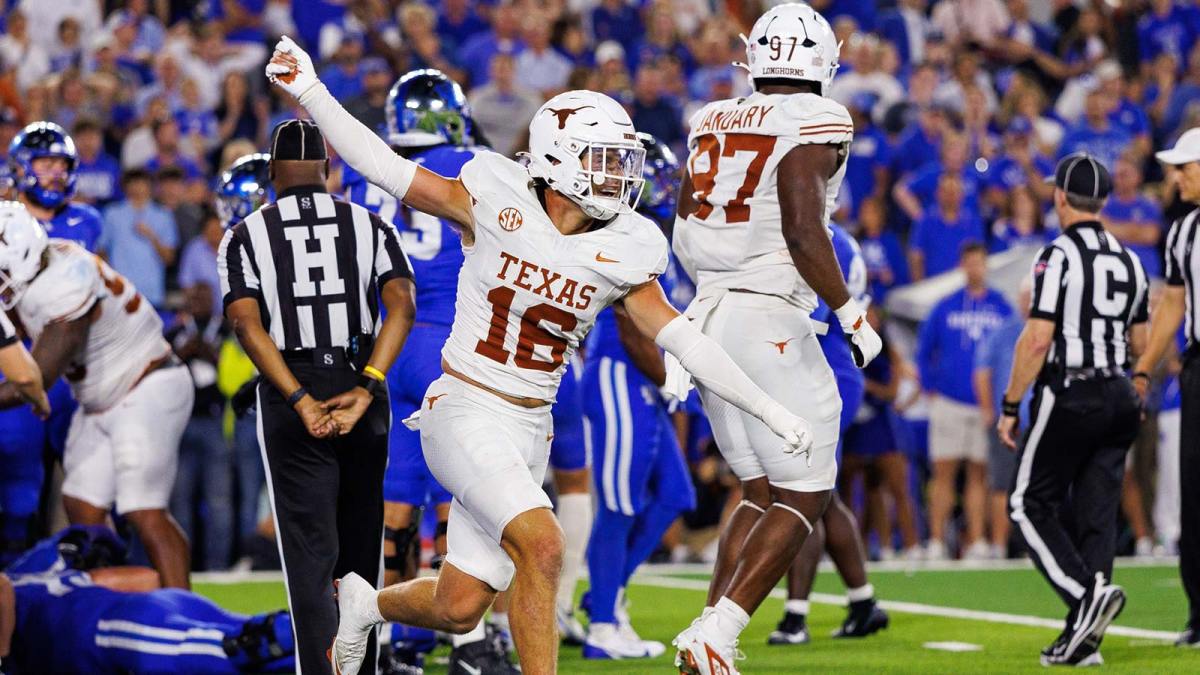 Texas Longhorns defensive back Michael Taaffe (16) celebrates after the Kentucky Wildcats fail to score during overtime at Kroger Field.