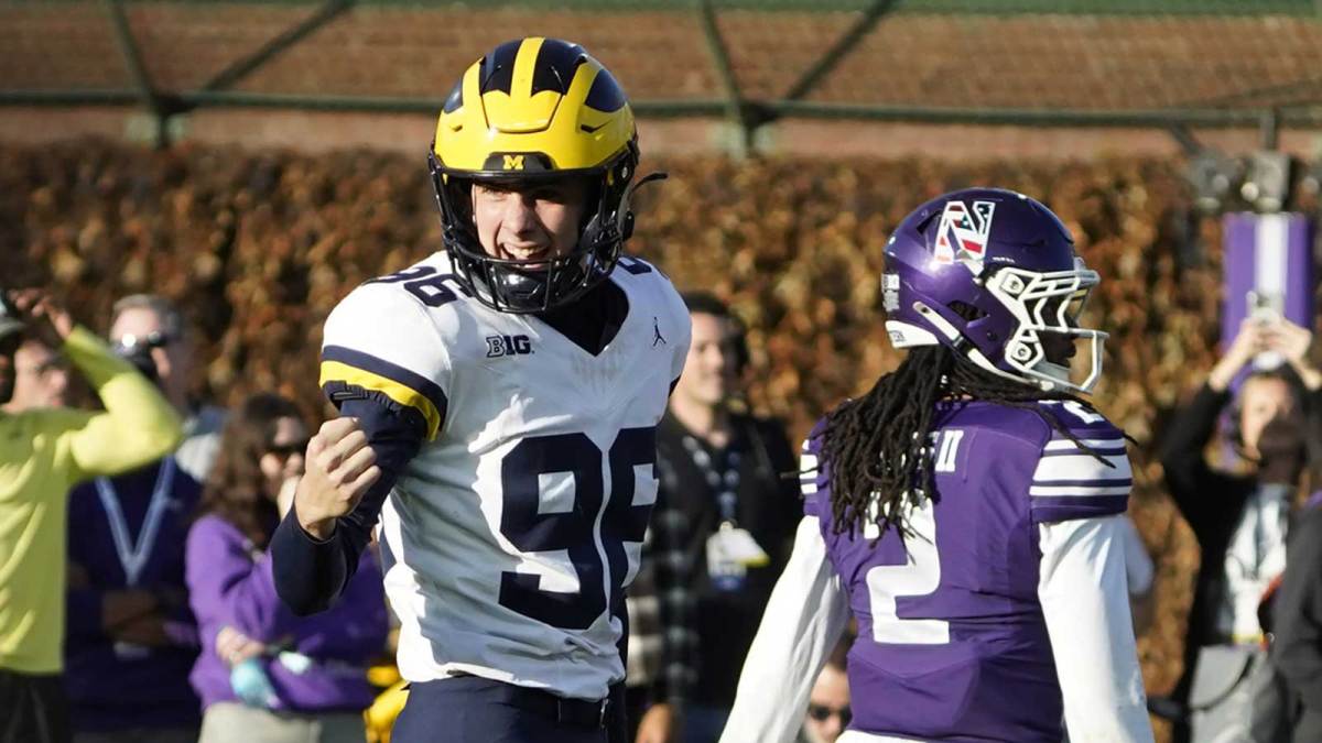 Michigan Wolverines kicker Dominic Zvada (96) celebrates his game winning field goal against the Northwestern Wildcats during the second half at Wrigley Field.