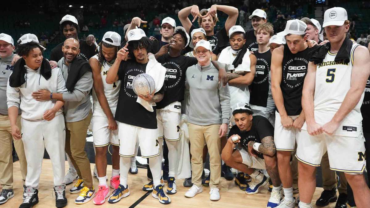 Michigan Wolverines pose for a photo after defeating the Gonzaga Bulldogs in the 2025 Players Era Festival championship game at MGM Grand Garden Arena.
