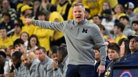 Michigan Wolverines head coach Dusty May yells during the first half against the Oakland Golden Grizzlies at Crisler Center.