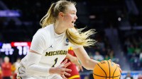 Michigan guard Olivia Olson (1) grabs a rebound during the first round of the NCAA Women's Basketball Tournament between Michigan and Iowa State.