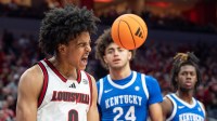 Louisville Cardinals guard Mikel Brown Jr. (0) celebrated after scoring and drawing a foul during the second half as the Louisville Cardinals hosted the Kentucky Wildcats at the KFC Yum! Center on Tuesday, Nov. 11, 2025. The Cardinals defeated the Wildcats 96-88.