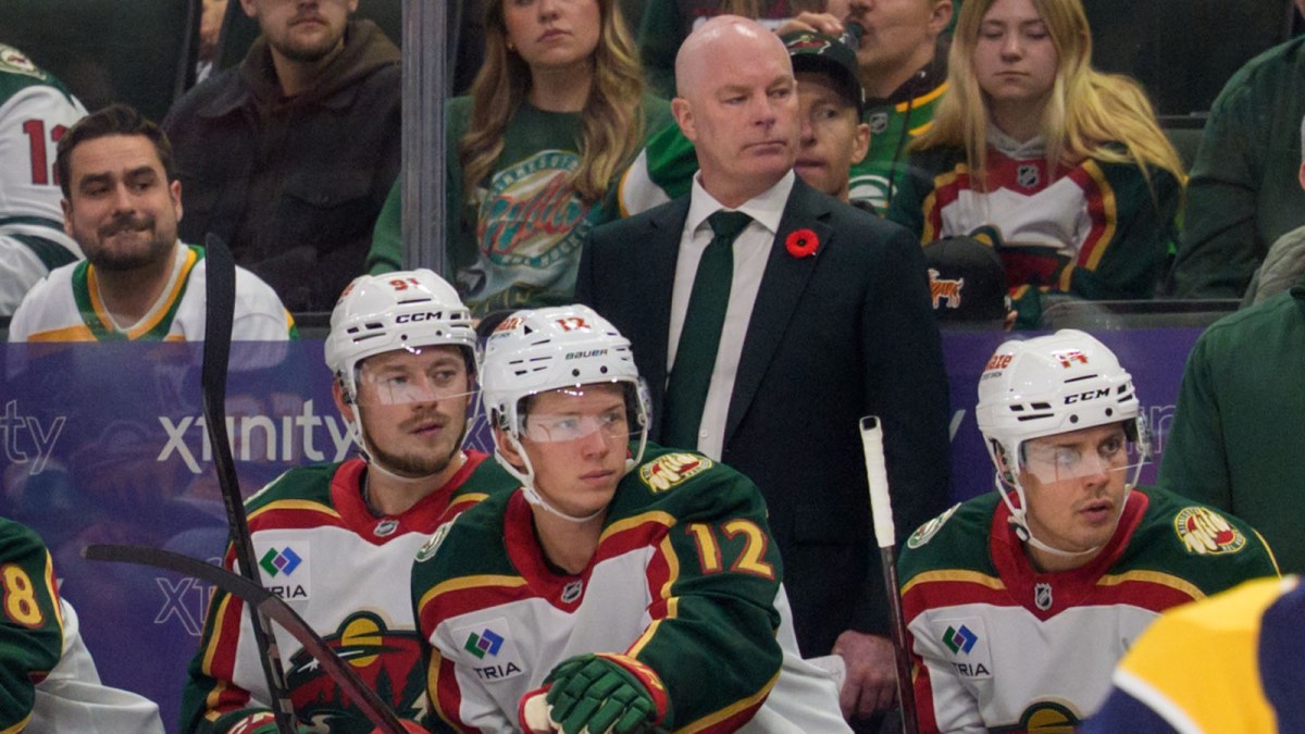 Minnesota Wild head coach John Hynes watches play against the Nashville Predators in the third period at Grand Casino Arena.