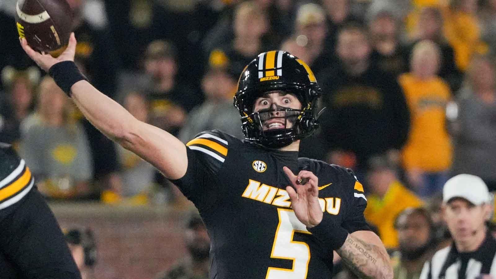 Missouri Tigers quarterback Matt Zollers (5) throws a pass against the Mississippi State Bulldogs during the first half of the game at Faurot Field at Memorial Stadium.