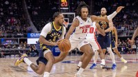 Indiana Pacers guard Monte Morris (3) drives to the basket as Detroit Pistons forward Isaac Jones (13) defends during the second half at Little Caesars Arena.