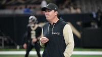 New Orleans Saints head coach Kellen Moore on the field prior to a game against the Atlanta Falcons at Caesars Superdome