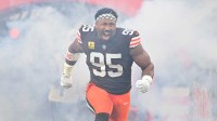 Cleveland Browns defensive end Myles Garrett (95) runs out during player introductions prior to a game against Baltimore Ravens at Huntington Bank Field. Mandatory Credit: Ken Blaze-Imagn Images
