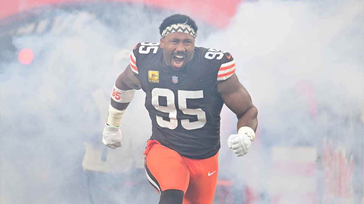 Cleveland Browns defensive end Myles Garrett (95) runs out during player introductions prior to a game against Baltimore Ravens at Huntington Bank Field.