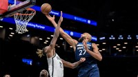 Minnesota Timberwolves center Rudy Gobert (27) shoots against Brooklyn Nets forward Noah Clowney (21) during the first half at Barclays Center.