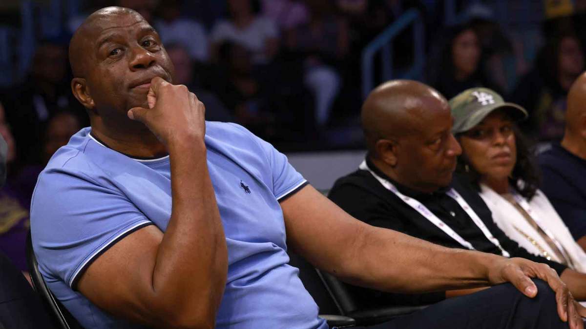 Magic Johnson attends a WNBA game between the Los Angeles Sparks and the Minnesota Lynx at Crypto.com Arena.