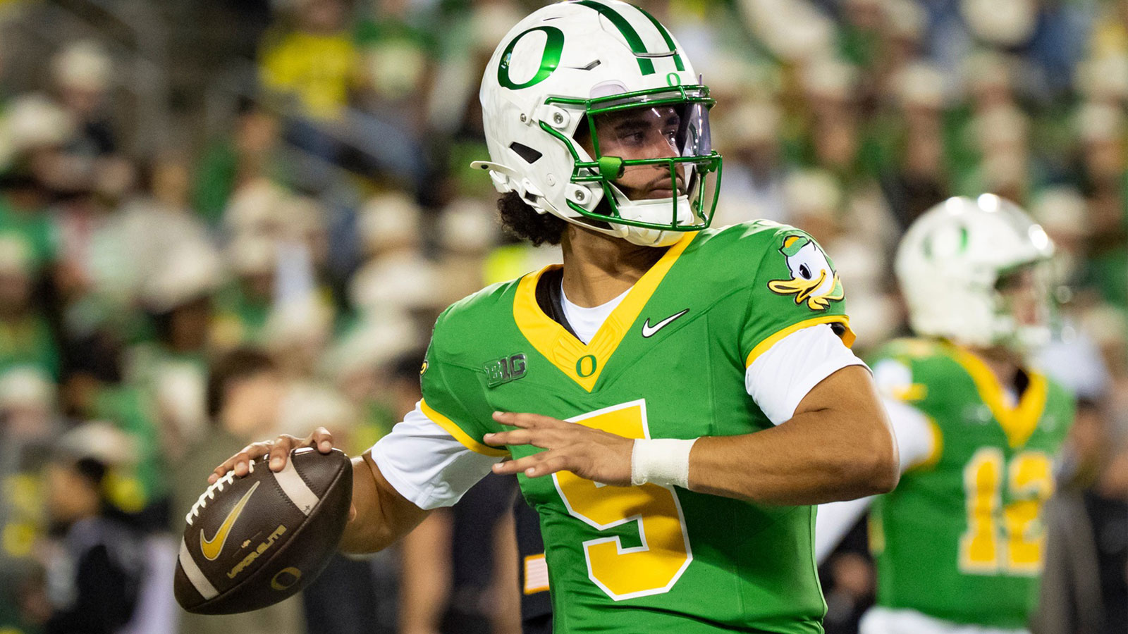 Oregon quarterback Dante Moore throws a pass before the game as the Oregon Ducks host the Minnesota Golden Gophers on Nov. 14, 2025, at Autzen Stadium in Eugene, Oregon.