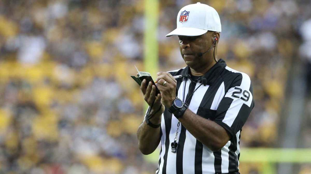 NFL referee Adrian Hill (29) makes a note during the game between the Seattle Seahawks and the Pittsburgh Steelers in the second quarter at Acrisure Stadium.