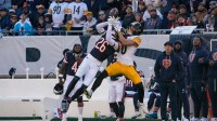 Chicago Bears cornerback Nahshon Wright (26) breaks up a pass to Pittsburgh Steelers wide receiver Roman Wilson (10) during the second half at Soldier Field.