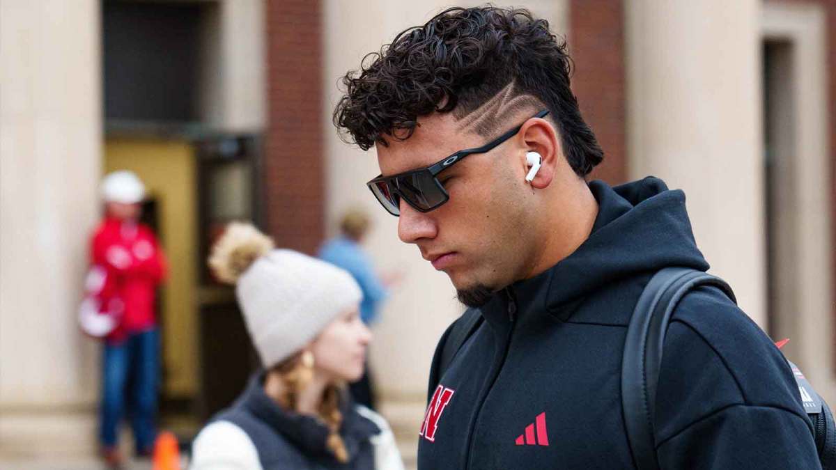 Nebraska Cornhuskers quarterback Dylan Raiola (15) arrives before the game against the Northwestern Wildcats at Memorial Stadium.