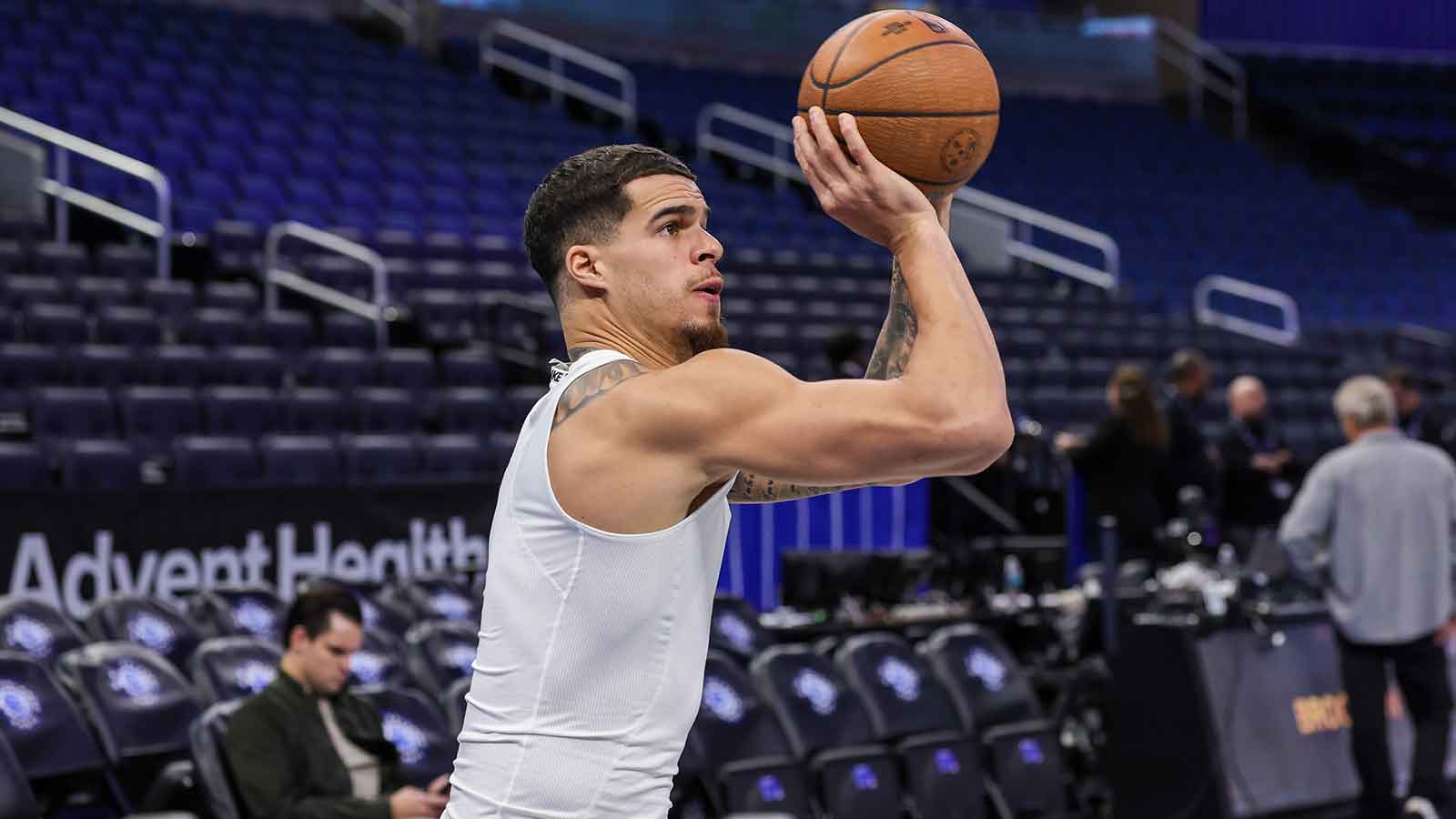 Nets forward Michael Porter Jr. (17) warms up before the game against the Orlando Magic at Kia Center