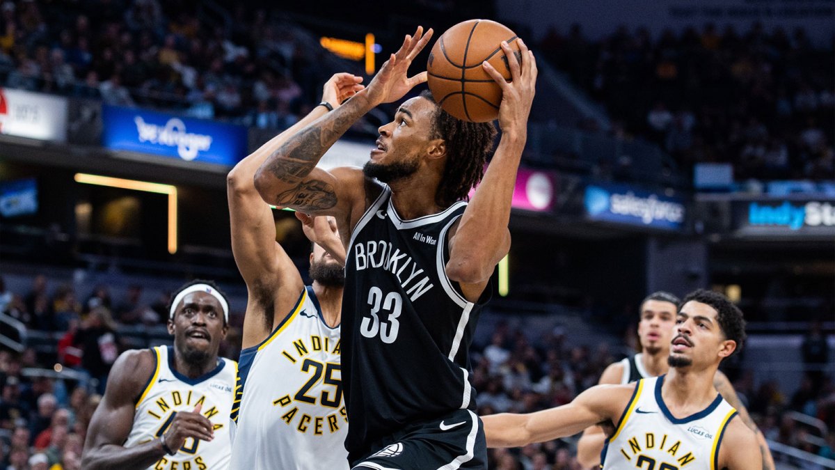 Brooklyn Nets center Nic Claxton (33) shoots the ball while Indiana Pacers forward Jeremiah Robinson-Earl (25) defends in the second half at Gainbridge Fieldhouse