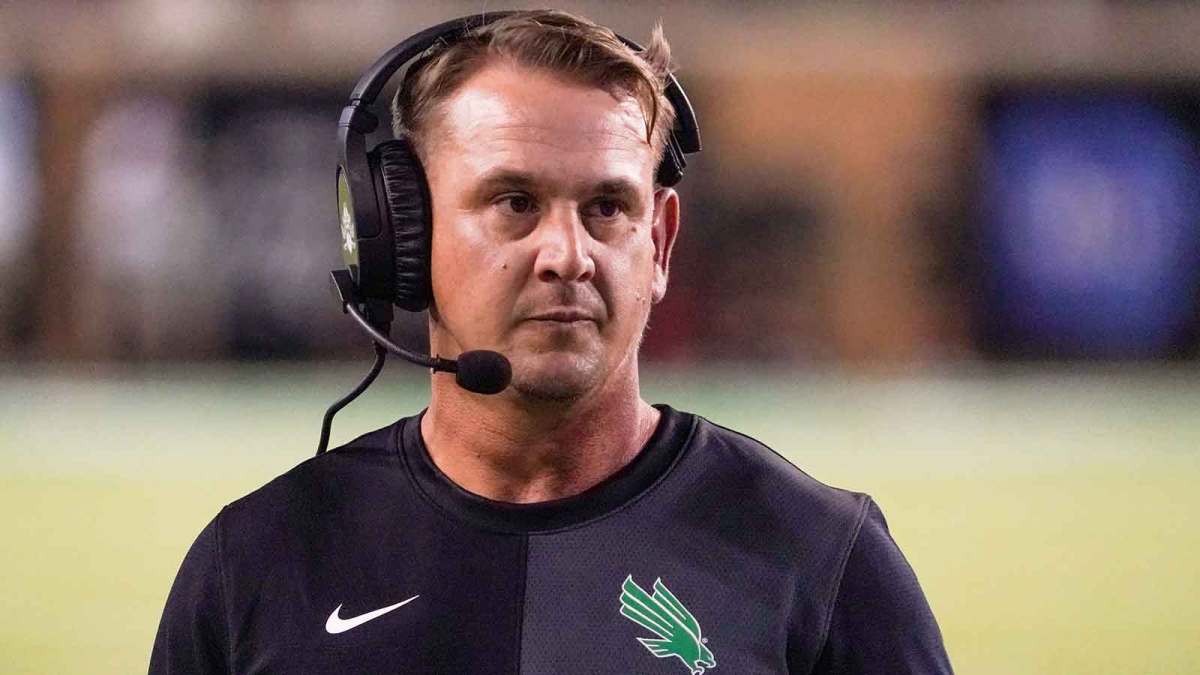 North Texas Mean Green head coach Eric Morris stands on the sidelines against the South Florida Bulls during the second half of a game at DATCU Stadium.