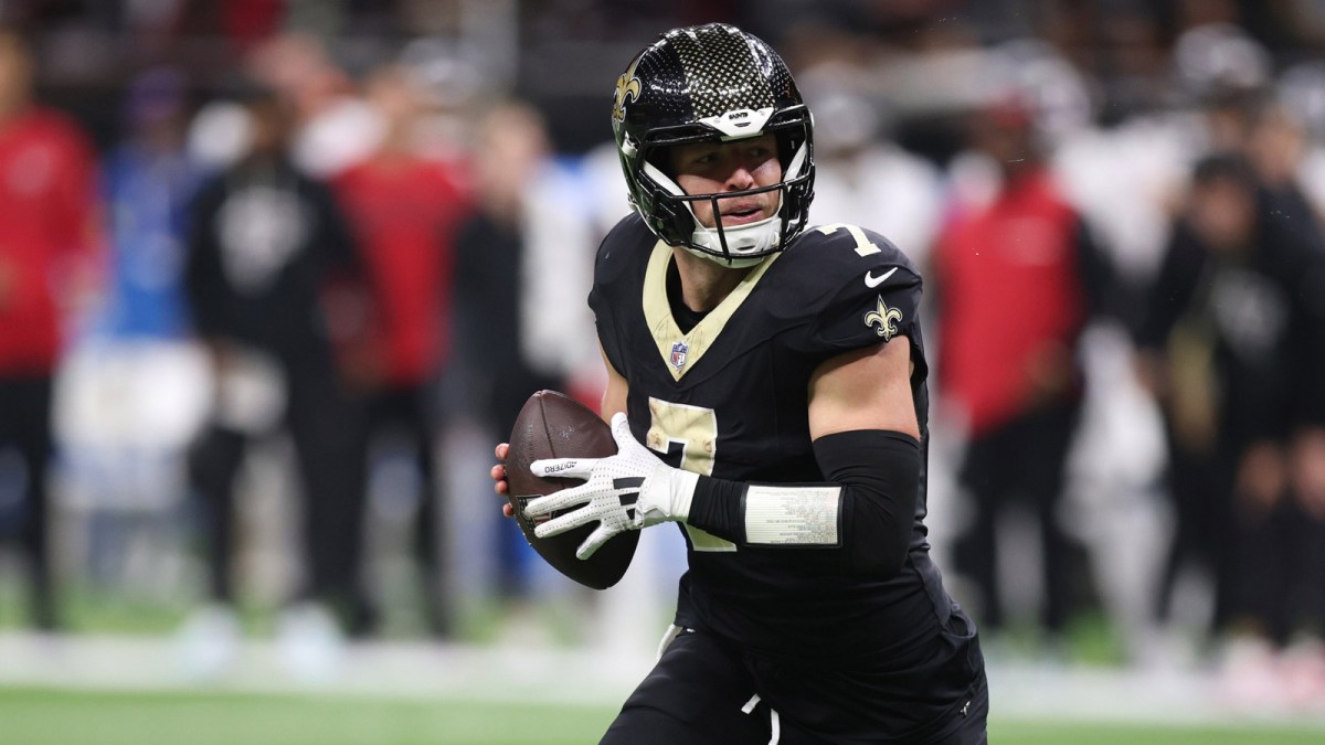 New Orleans Saints quarterback Taysom Hill (7) rolls out against the Atlanta Falcons during the second half at Caesars Superdome.