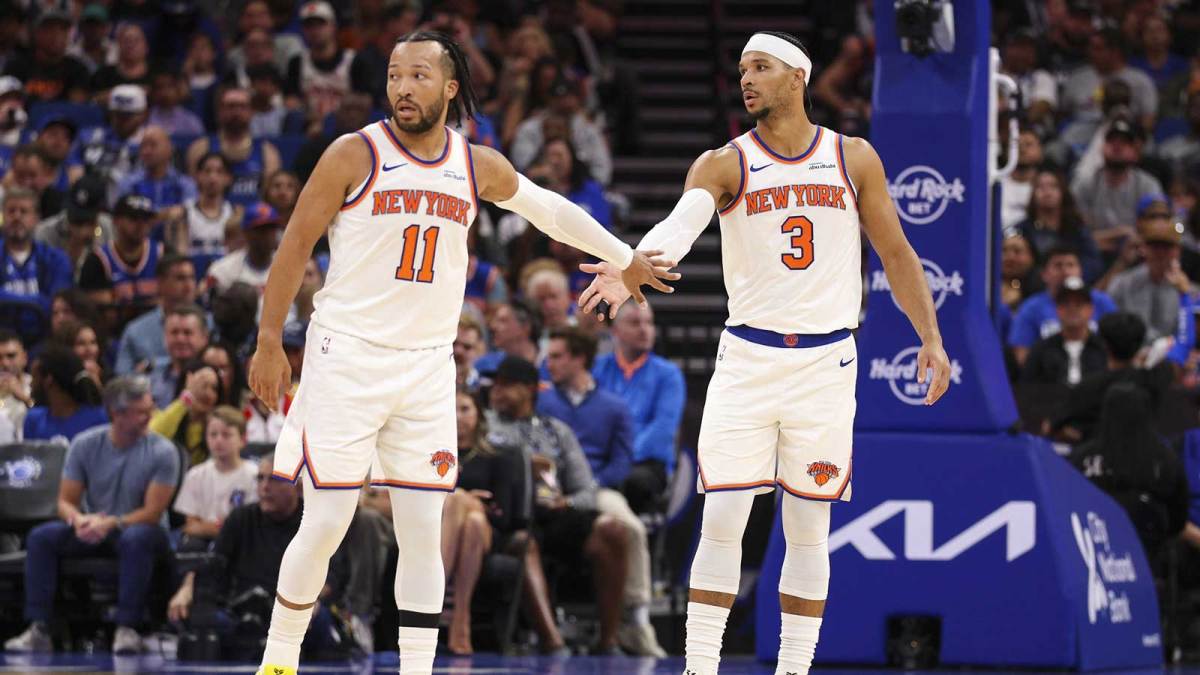New York Knicks guard Jalen Brunson (11) and guard Josh Hart (3) react after a play against the Orlando Magic in the second quarter at Kia Center. Mandatory Credit: Nathan Ray Seebeck-Imagn Images
