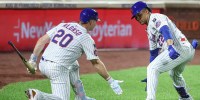 New York Mets right fielder Juan Soto (22) is greeted by first baseman Pete Alonso (20) after hitting a two run home run in the second inning against the Atlanta Braves at Citi Field.
