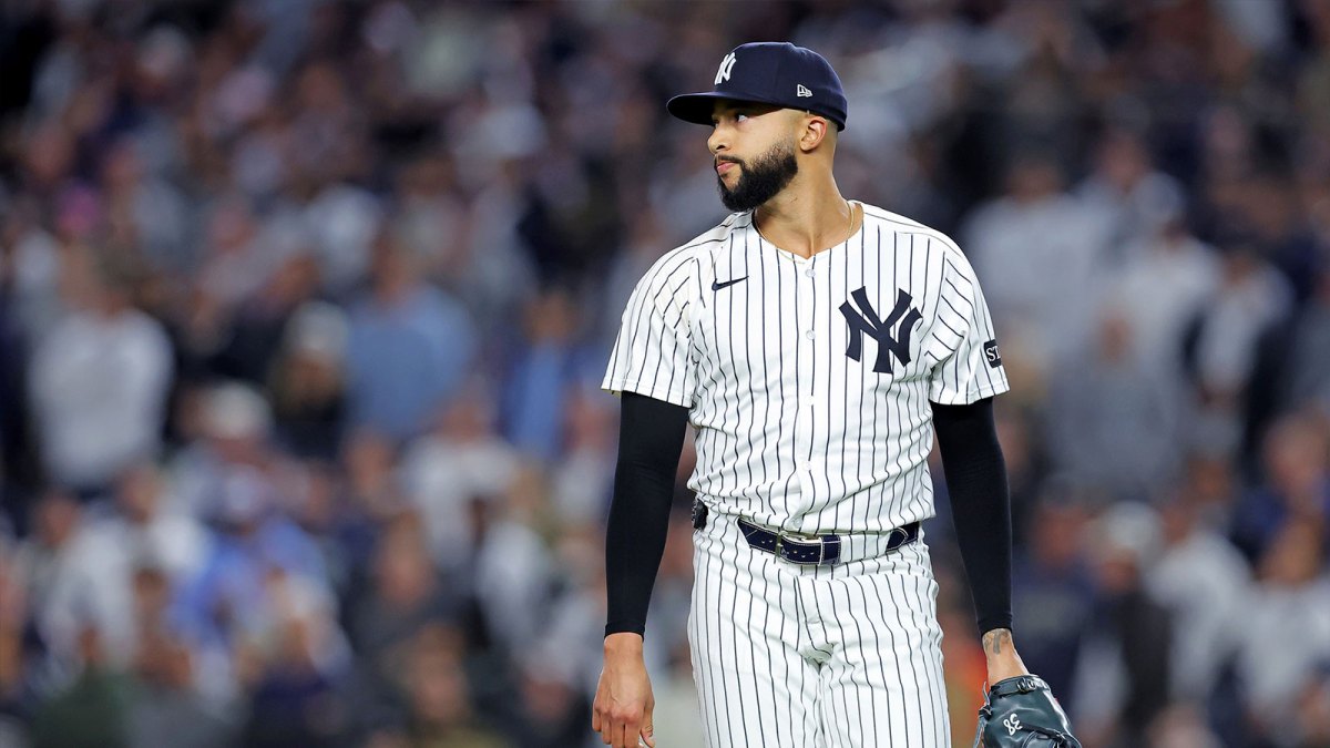 New York Yankees pitcher Devin Williams (38) reacts after giving up a two run RBI during the seventh inning during game four of the ALDS round for the 2025 MLB playoffs at Yankee Stadium. Mandatory Credit: Brad Penner-Imagn Images
