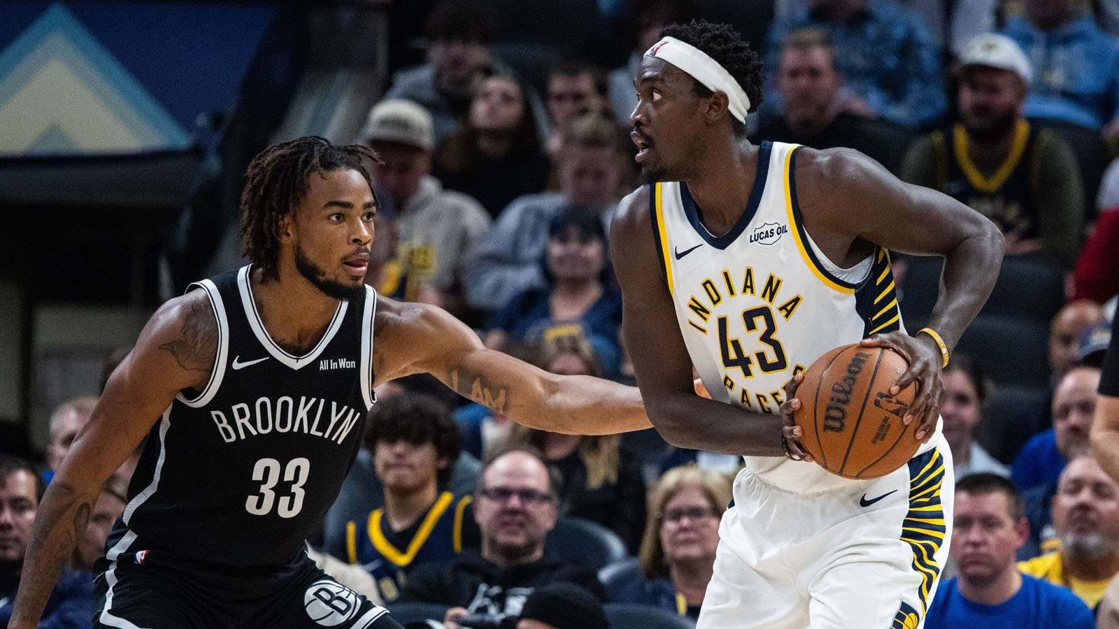 Indiana Pacers forward Pascal Siakam (43) holds the ball while Brooklyn Nets center Nic Claxton (33) defends in the second half at Gainbridge Fieldhouse.